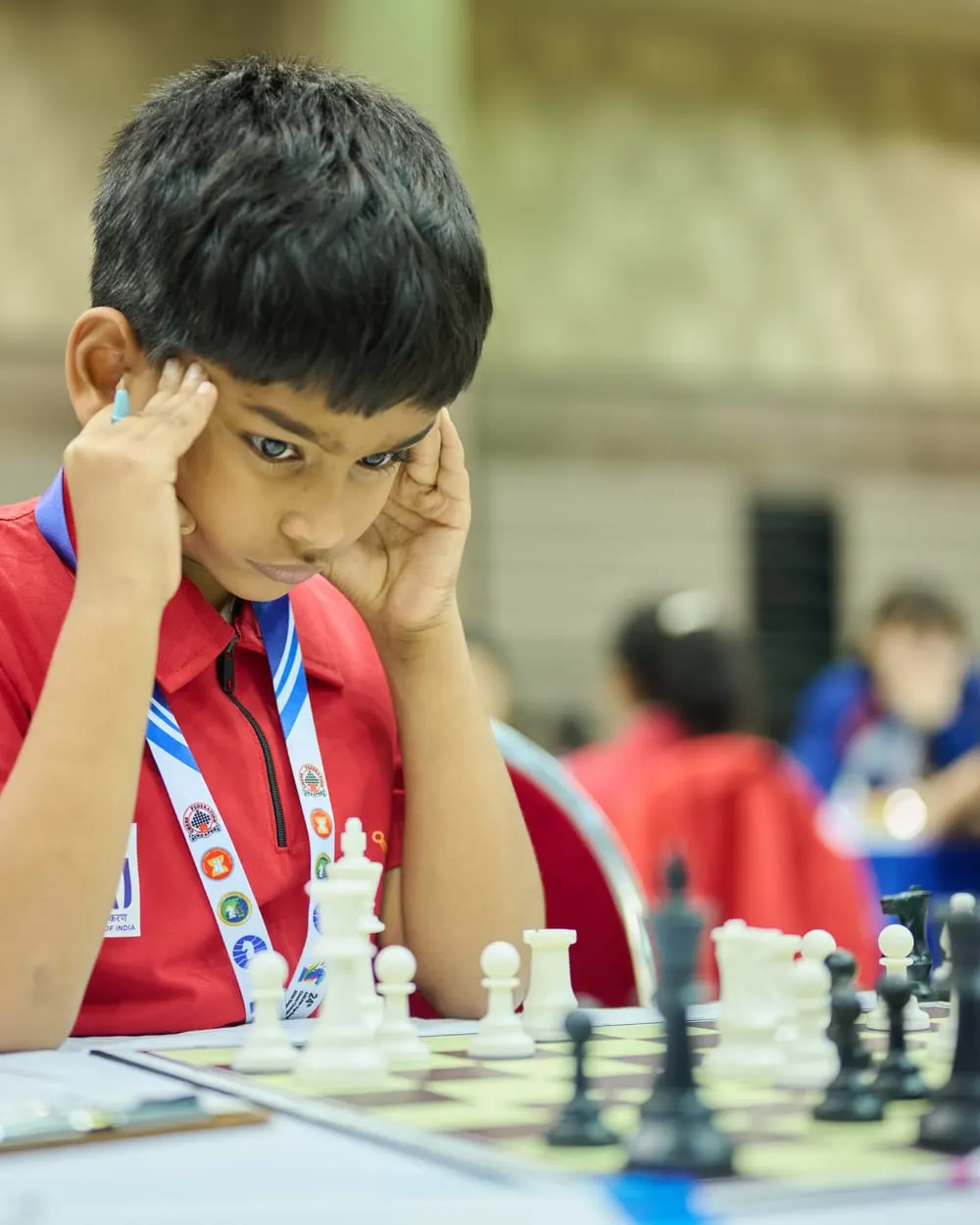 Riyaan Sidharth in India colours, deep in concentration at the board during the 24th ASEAN+ Age-Group Chess Championships in Singapore