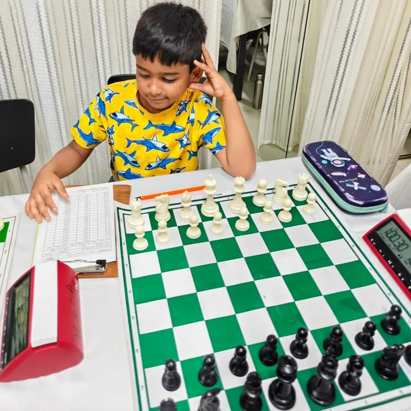Riyaan Sidharth concentrating at the chessboard during a tournament game