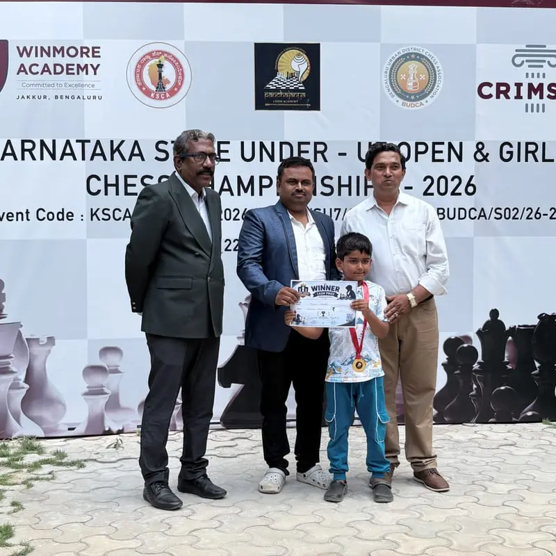 Riyaan receiving his award on the championship stage